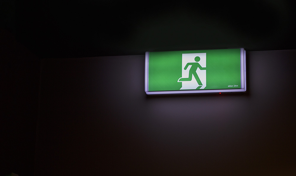 exit sign above door